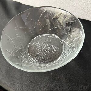 Set of 4 vintage Coca Cola bowls w/embossed coke bottles around the edge.